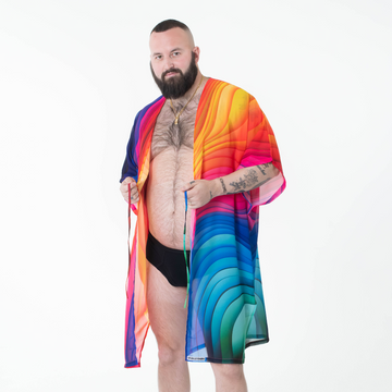 A man wears a rainbow kimono